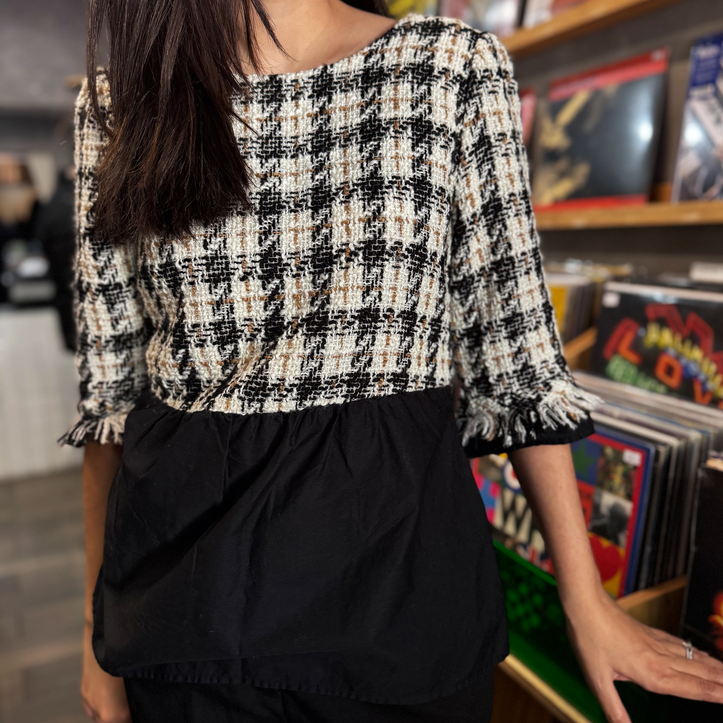 Blusa peplum con tweed