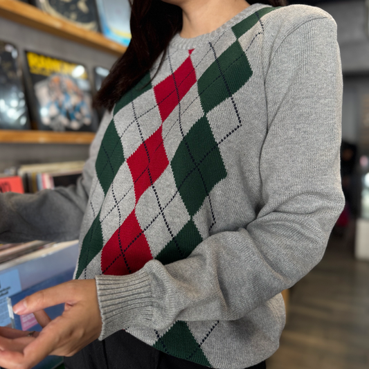 Suéter preppy con rombos